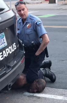 George Floyd neck knelt on by police officer